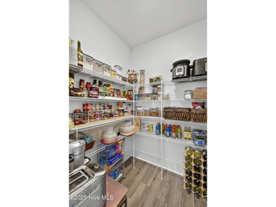 Welcome to 7952 Harrier Circle in the sought-after Heron Pointe on Cape Fear National At Brunswick Forest in North Carolina - for sale on GolfHomes.com, golf home, golf lot