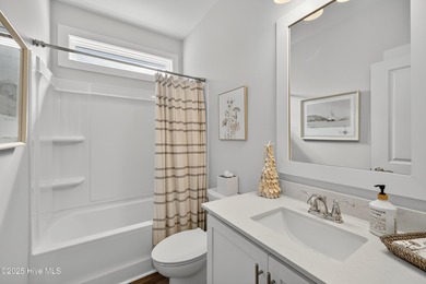 Welcome to 7952 Harrier Circle in the sought-after Heron Pointe on Cape Fear National At Brunswick Forest in North Carolina - for sale on GolfHomes.com, golf home, golf lot