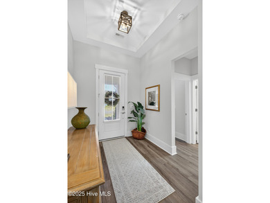 Welcome to 7952 Harrier Circle in the sought-after Heron Pointe on Cape Fear National At Brunswick Forest in North Carolina - for sale on GolfHomes.com, golf home, golf lot