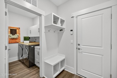 Welcome to 7952 Harrier Circle in the sought-after Heron Pointe on Cape Fear National At Brunswick Forest in North Carolina - for sale on GolfHomes.com, golf home, golf lot