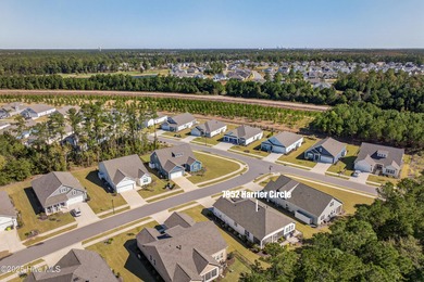 Welcome to 7952 Harrier Circle in the sought-after Heron Pointe on Cape Fear National At Brunswick Forest in North Carolina - for sale on GolfHomes.com, golf home, golf lot