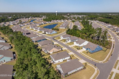 Welcome to 7952 Harrier Circle in the sought-after Heron Pointe on Cape Fear National At Brunswick Forest in North Carolina - for sale on GolfHomes.com, golf home, golf lot