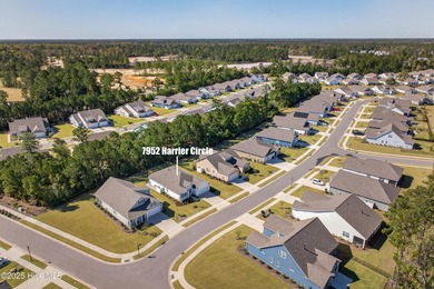 Welcome to 7952 Harrier Circle in the sought-after Heron Pointe on Cape Fear National At Brunswick Forest in North Carolina - for sale on GolfHomes.com, golf home, golf lot