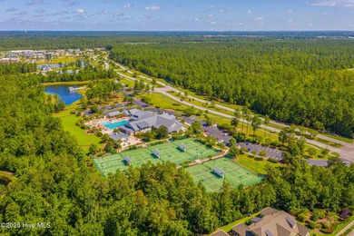 Welcome to 7952 Harrier Circle in the sought-after Heron Pointe on Cape Fear National At Brunswick Forest in North Carolina - for sale on GolfHomes.com, golf home, golf lot