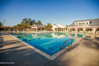 Welcome to 7952 Harrier Circle in the sought-after Heron Pointe on Cape Fear National At Brunswick Forest in North Carolina - for sale on GolfHomes.com, golf home, golf lot