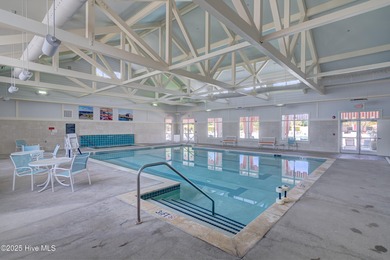 Welcome to 7952 Harrier Circle in the sought-after Heron Pointe on Cape Fear National At Brunswick Forest in North Carolina - for sale on GolfHomes.com, golf home, golf lot