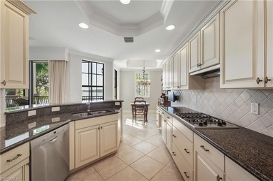 Wake-up to beachfront serenity & panoramic lake views from this on Miromar Lakes Golf Club in Florida - for sale on GolfHomes.com, golf home, golf lot