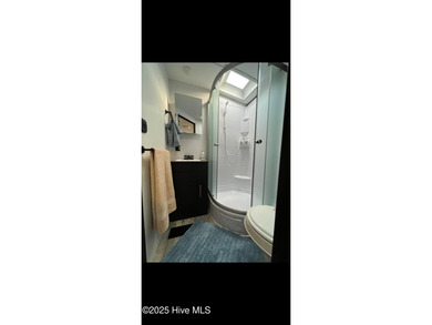 Adorable and very clean 2022 Keystone Springdale located on a on North Shore Country Club in North Carolina - for sale on GolfHomes.com, golf home, golf lot