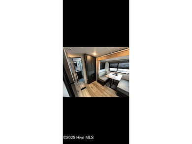 Adorable and very clean 2022 Keystone Springdale located on a on North Shore Country Club in North Carolina - for sale on GolfHomes.com, golf home, golf lot