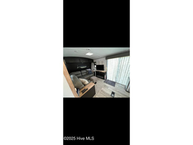 Adorable and very clean 2022 Keystone Springdale located on a on North Shore Country Club in North Carolina - for sale on GolfHomes.com, golf home, golf lot