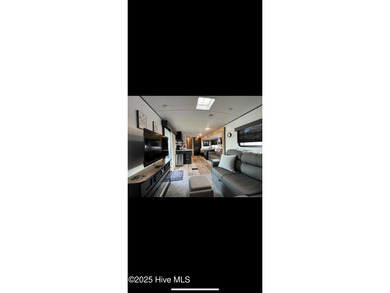 Adorable and very clean 2022 Keystone Springdale located on a on North Shore Country Club in North Carolina - for sale on GolfHomes.com, golf home, golf lot