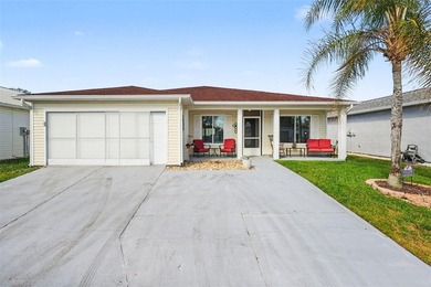 Experience relaxed Florida living in this well-maintained on Tampa Bay Golf and Country Club in Florida - for sale on GolfHomes.com, golf home, golf lot