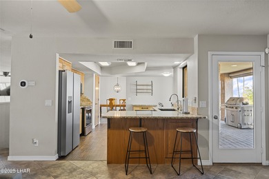 Welcome to 1893 Chip Dr, your dream turn key home, fully on London Bridge Golf Course in Arizona - for sale on GolfHomes.com, golf home, golf lot