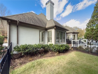 Modern luxury meets classic Southern charm in this iconic Laurel on Laurel Springs Golf Club in Georgia - for sale on GolfHomes.com, golf home, golf lot