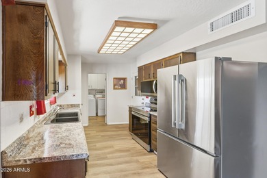 Adorable Apache Model Home In The Heart Of Phase 2 Of Sun City on Sun City Lakes West and East in Arizona - for sale on GolfHomes.com, golf home, golf lot