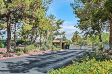 Nestled within a guard gated golf course community, this on Painted Desert Golf Club in Nevada - for sale on GolfHomes.com, golf home, golf lot