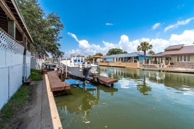 If you're looking for a waterfront investment or renovation on Rockport Country Club in Texas - for sale on GolfHomes.com, golf home, golf lot