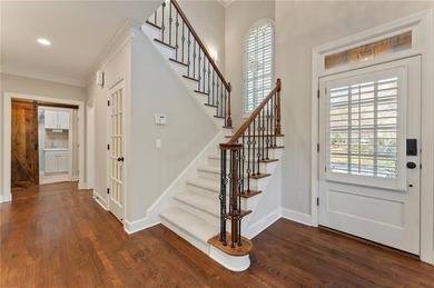 Modern luxury meets classic Southern charm in this iconic Laurel on Laurel Springs Golf Club in Georgia - for sale on GolfHomes.com, golf home, golf lot