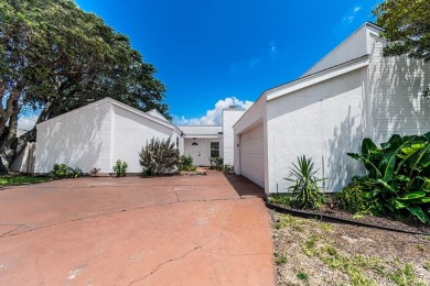If you're looking for a waterfront investment or renovation on Rockport Country Club in Texas - for sale on GolfHomes.com, golf home, golf lot