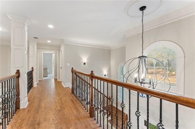 Modern luxury meets classic Southern charm in this iconic Laurel on Laurel Springs Golf Club in Georgia - for sale on GolfHomes.com, golf home, golf lot