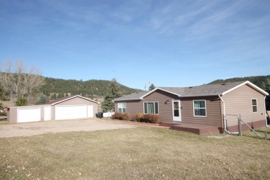 Well Maintained and updated 3 bedroom 2 bath home with an open on Boulder Canyon Country Club in South Dakota - for sale on GolfHomes.com, golf home, golf lot