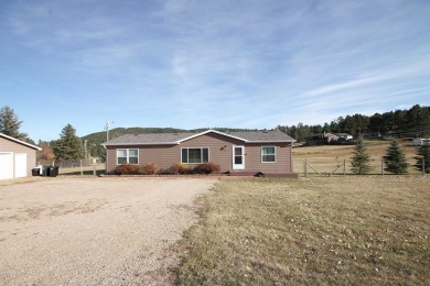 Well Maintained and updated 3 bedroom 2 bath home with an open on Boulder Canyon Country Club in South Dakota - for sale on GolfHomes.com, golf home, golf lot