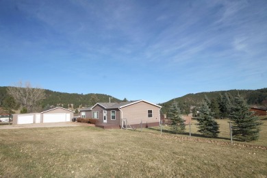 Well Maintained and updated 3 bedroom 2 bath home with an open on Boulder Canyon Country Club in South Dakota - for sale on GolfHomes.com, golf home, golf lot