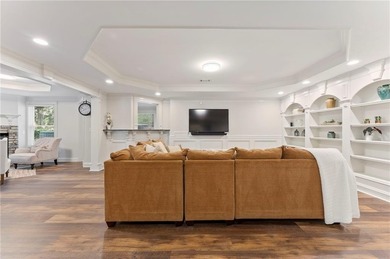 Modern luxury meets classic Southern charm in this iconic Laurel on Laurel Springs Golf Club in Georgia - for sale on GolfHomes.com, golf home, golf lot