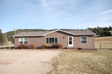 Well Maintained and updated 3 bedroom 2 bath home with an open on Boulder Canyon Country Club in South Dakota - for sale on GolfHomes.com, golf home, golf lot