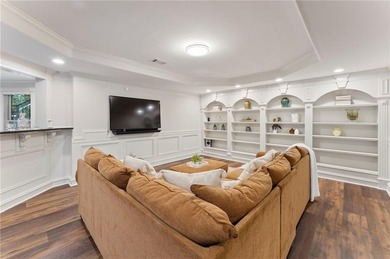 Modern luxury meets classic Southern charm in this iconic Laurel on Laurel Springs Golf Club in Georgia - for sale on GolfHomes.com, golf home, golf lot