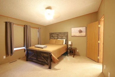 Well Maintained and updated 3 bedroom 2 bath home with an open on Boulder Canyon Country Club in South Dakota - for sale on GolfHomes.com, golf home, golf lot