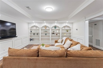 Modern luxury meets classic Southern charm in this iconic Laurel on Laurel Springs Golf Club in Georgia - for sale on GolfHomes.com, golf home, golf lot