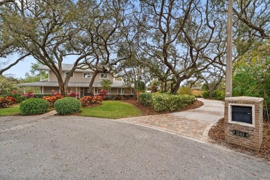 Nestled on a quiet cul-de-sac in the sought-after Weybridge on The Dunedin Country Club in Florida - for sale on GolfHomes.com, golf home, golf lot