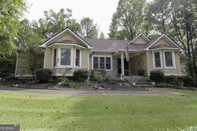 An absolutely beautiful home situated on a natural wooded on Canongate On White Oak Golf Course in Georgia - for sale on GolfHomes.com, golf home, golf lot