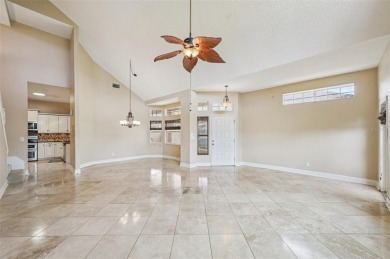 Enjoy refined living in this elegant 3-bedroom, 2.5-bath home on Falcon Watch Golf Club in Florida - for sale on GolfHomes.com, golf home, golf lot