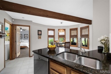 Stop the car! Updated 4 bedroom, 2 bath home tucked away in a on Lake Saint Louis Par 3 in Missouri - for sale on GolfHomes.com, golf home, golf lot
