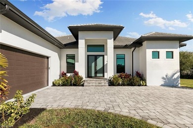 Coastal elegance meets luxury & convenience in this breathtaking on Eagle Lakes Golf Club in Florida - for sale on GolfHomes.com, golf home, golf lot