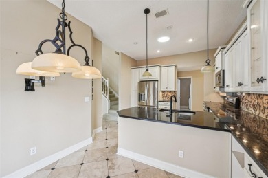 Enjoy refined living in this elegant 3-bedroom, 2.5-bath home on Falcon Watch Golf Club in Florida - for sale on GolfHomes.com, golf home, golf lot