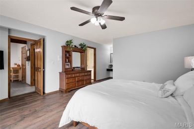 Stop the car! Updated 4 bedroom, 2 bath home tucked away in a on Lake Saint Louis Par 3 in Missouri - for sale on GolfHomes.com, golf home, golf lot