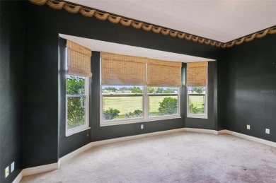 Enjoy refined living in this elegant 3-bedroom, 2.5-bath home on Falcon Watch Golf Club in Florida - for sale on GolfHomes.com, golf home, golf lot