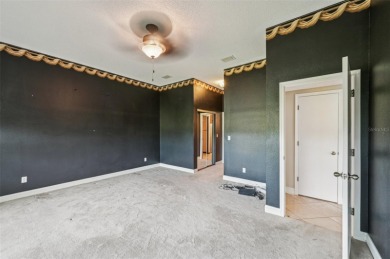 Enjoy refined living in this elegant 3-bedroom, 2.5-bath home on Falcon Watch Golf Club in Florida - for sale on GolfHomes.com, golf home, golf lot