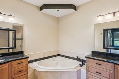 Enjoy refined living in this elegant 3-bedroom, 2.5-bath home on Falcon Watch Golf Club in Florida - for sale on GolfHomes.com, golf home, golf lot