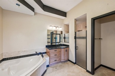 Enjoy refined living in this elegant 3-bedroom, 2.5-bath home on Falcon Watch Golf Club in Florida - for sale on GolfHomes.com, golf home, golf lot