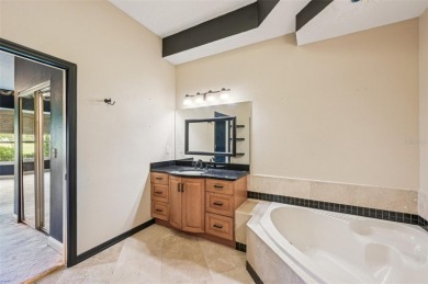 Enjoy refined living in this elegant 3-bedroom, 2.5-bath home on Falcon Watch Golf Club in Florida - for sale on GolfHomes.com, golf home, golf lot
