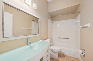 Enjoy refined living in this elegant 3-bedroom, 2.5-bath home on Falcon Watch Golf Club in Florida - for sale on GolfHomes.com, golf home, golf lot