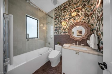 This residence has been completely reimagined in 2024 with a on Grey Oaks Golf and Country Club in Florida - for sale on GolfHomes.com, golf home, golf lot