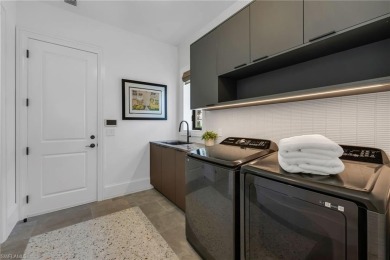 This residence has been completely reimagined in 2024 with a on Grey Oaks Golf and Country Club in Florida - for sale on GolfHomes.com, golf home, golf lot
