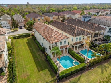 **ACTIVE RESORT MEMBERSHIP*** This immaculate two-story on Reunion Resort Golf Course in Florida - for sale on GolfHomes.com, golf home, golf lot