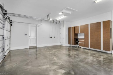 This residence has been completely reimagined in 2024 with a on Grey Oaks Golf and Country Club in Florida - for sale on GolfHomes.com, golf home, golf lot