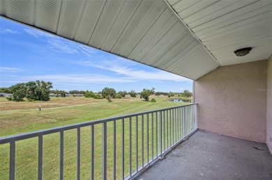 Enjoy refined living in this elegant 3-bedroom, 2.5-bath home on Falcon Watch Golf Club in Florida - for sale on GolfHomes.com, golf home, golf lot